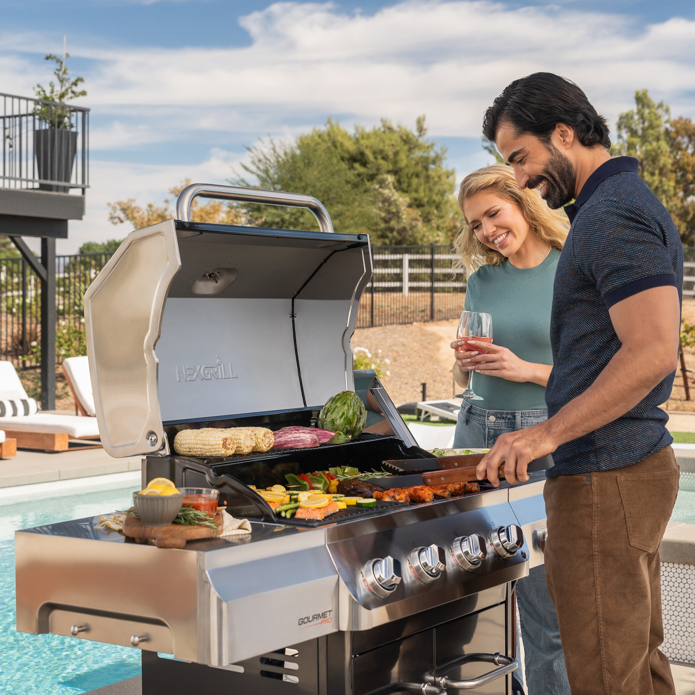 Gourmet Pro 4-Burner Gas Grill with Side Burner in Black with Cover|NX
